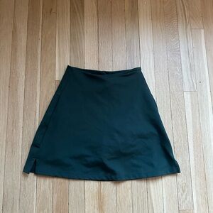 Girlfriend Collective green tennis skirt